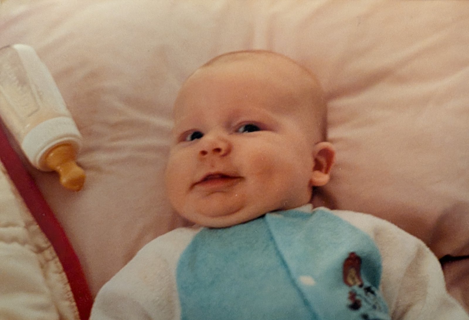 A new born baby in his crib